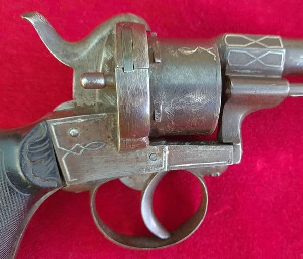 X X X SOLD X X X A scarce double action pinfire revolver with silver inlay. Circa 1865. Ref 3336